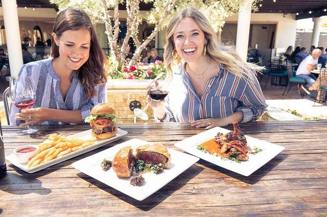 Two sisters smile with Avensole lunch items ready to eat