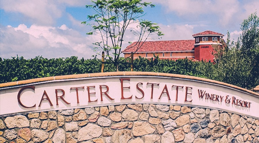 picture of the stone wall entry of Carter Estate Winery & Resort