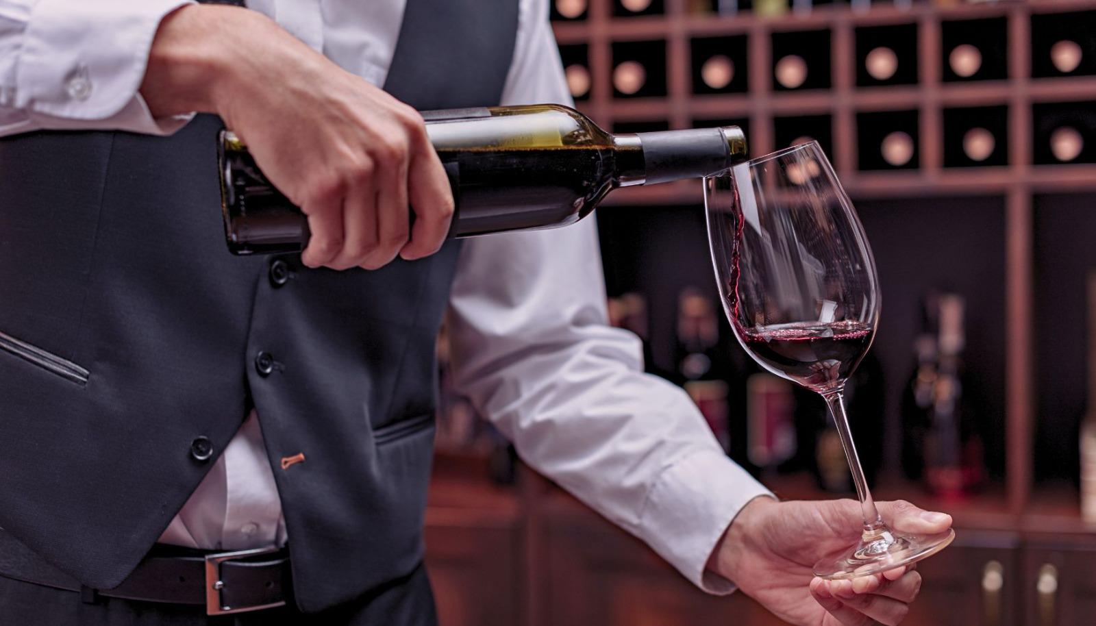 Sommelier providing a private wine tasting
