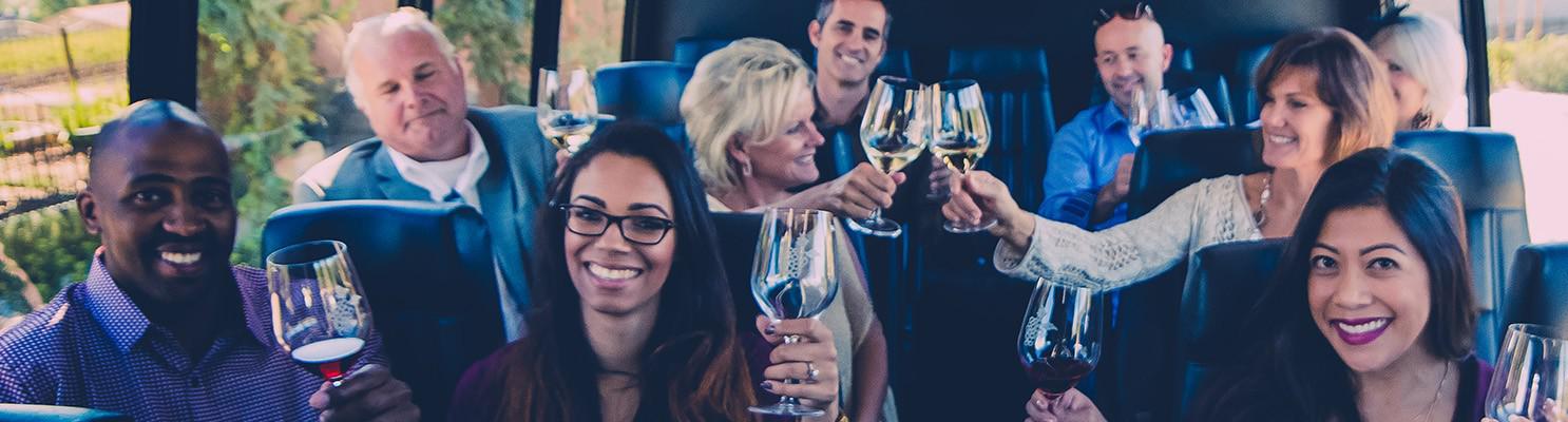 People toasting with wine on a Santa Barbara wine tour