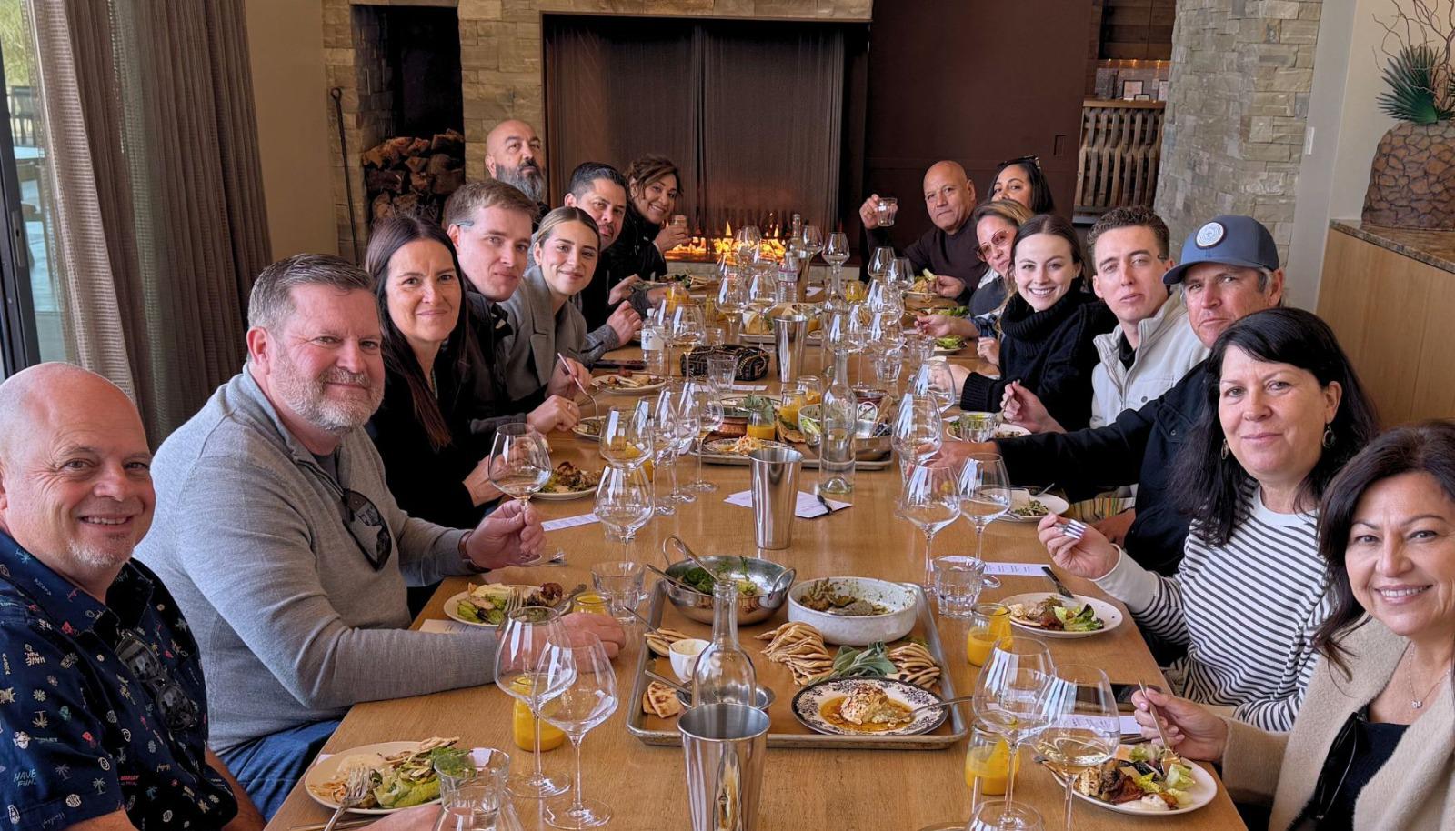 Group enjoying a catered lunch at a winery.