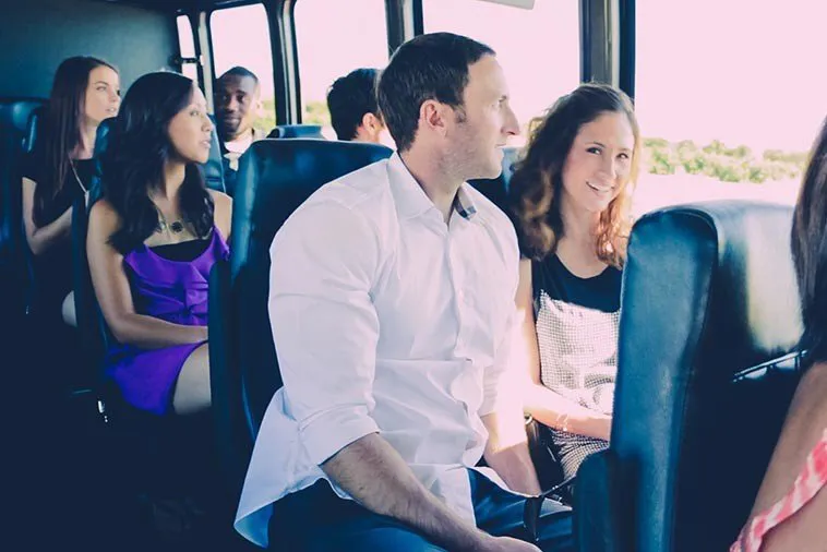 Friends on a wine tour bus