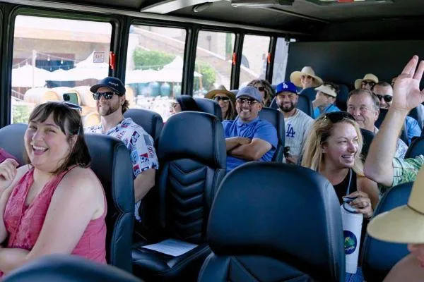 Grapeline shuttle with happy guests.