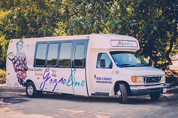 The Grapeline wine country shuttle is spotted pulling into a Sonoma Valley winery with anxious guests ready to taste and enjoy a picnic lunch.