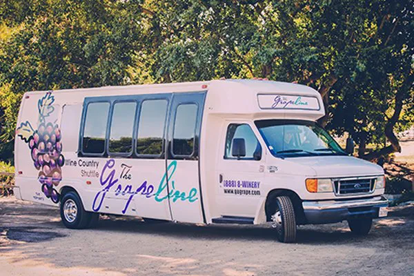 The Grapeline wine country shuttle is spotted pulling into a Sonoma Valley winery with anxious guests ready to taste and enjoy a picnic lunch.